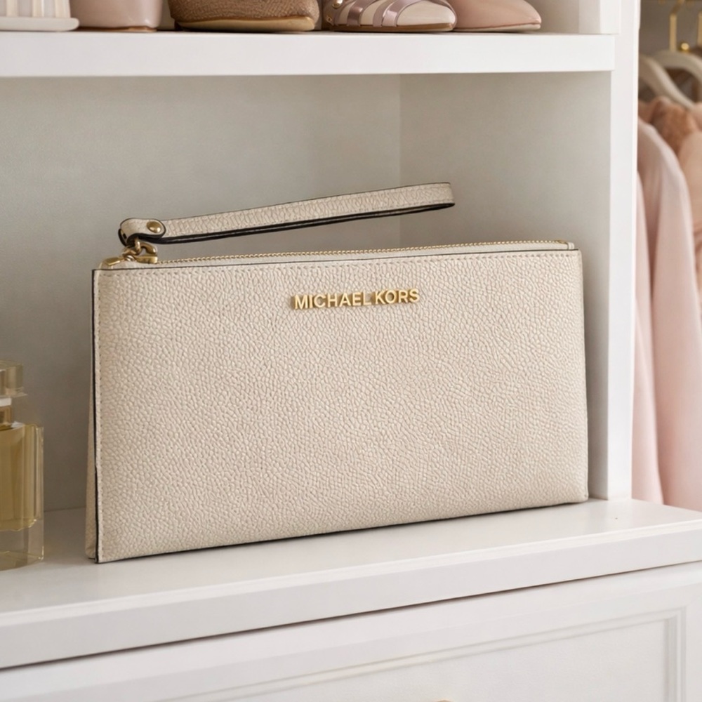Michael Kors cream Wristlet with Gold Accent